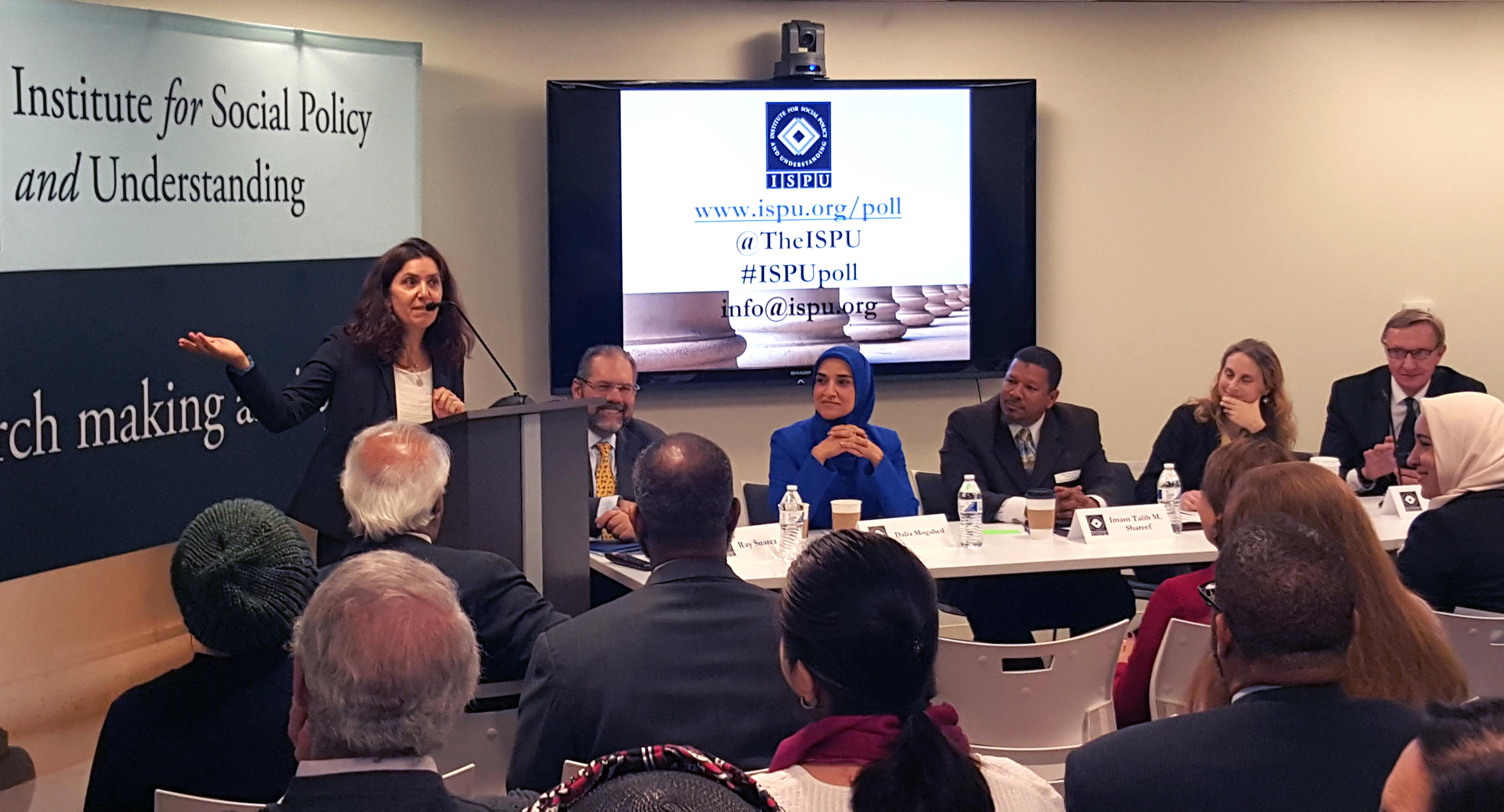 A group of presenters reveal the results of ISPU's first nationwide survey: American Muslim Poll 2016