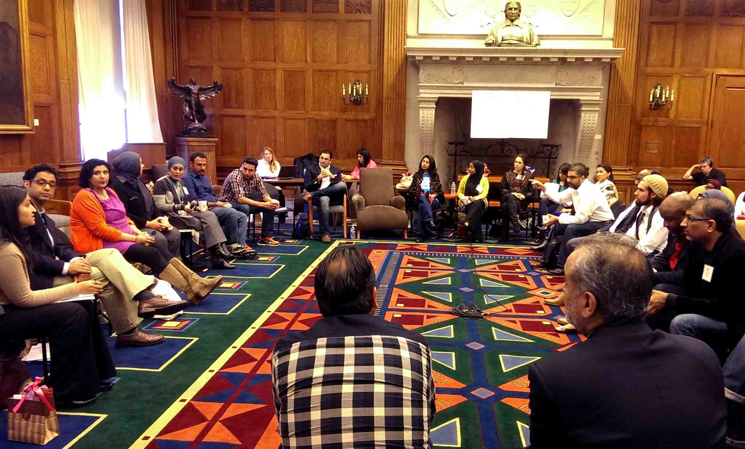 Attendees of the (Re)presenting American Muslim workshop sit in a circle discussing key topics