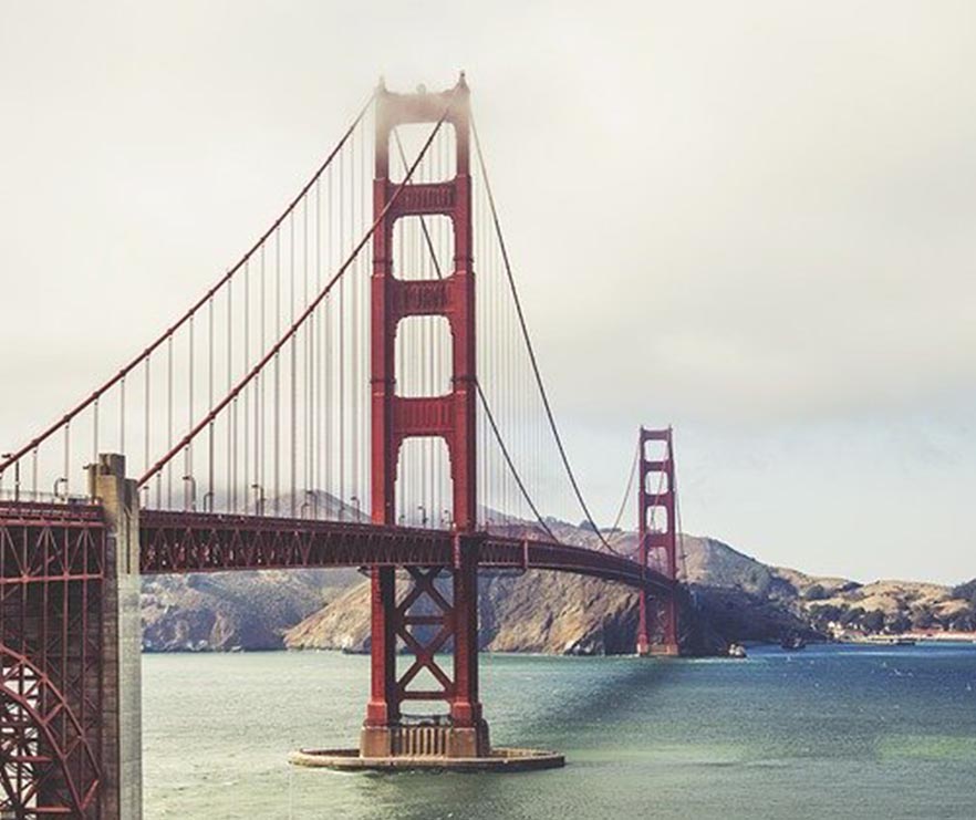 The Golden Gate Bridge covered in fog