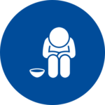 An icon of a person sitting and looking at the ground with an empty bowl next to them